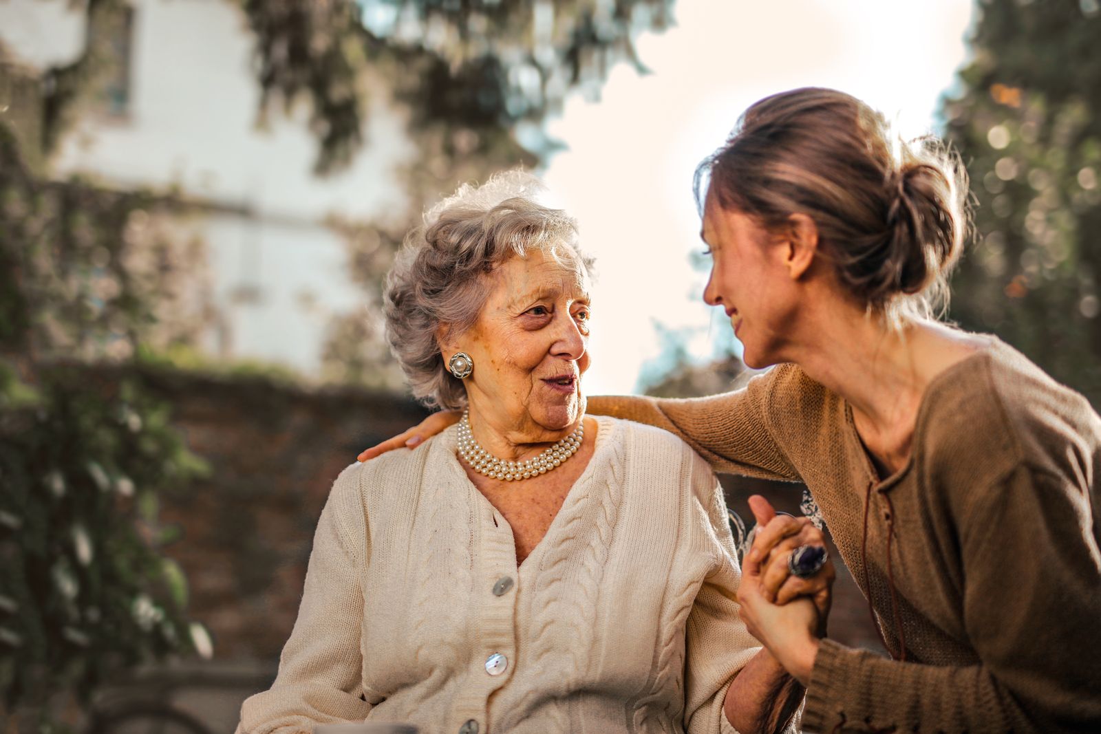 A family caregiver supporting an older adult at home